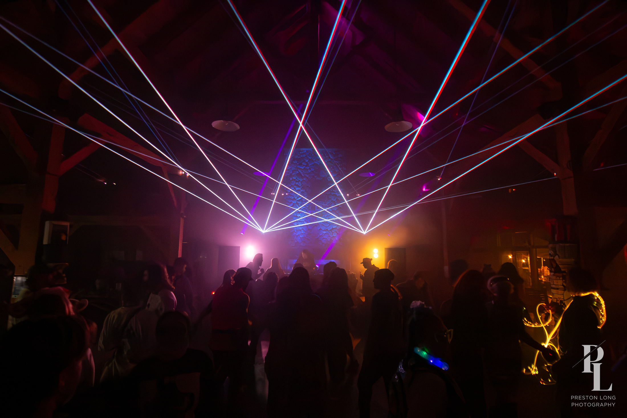 laser fan over the crowd at a black label radio show